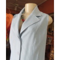 Cornflower blue sleeveless top/jacket from the 80`s by TOPICS size 40/16.Dummy pockets.3 Buttons