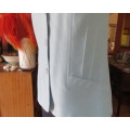 Cornflower blue sleeveless top/jacket from the 80`s by TOPICS size 40/16.Dummy pockets.3 Buttons