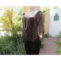 Glamour soot black stetch lace with netting overlay top.One sleeve/one strap.Size 38 by RIMODA.