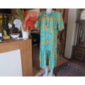As new vintage dropped waist dress in cool greens and turquoise.Size 44/20 b PRODUCTION STREET.