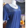 Navy creased viscose/poly slip over top with front lace yoke.Bell sleeves.Size 42/18. New condition.
