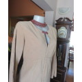 Ultra chic wheat shade slip over long sleeve top in suede look.Brown decor stitching.Size 36 by NEWS