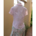 Pretty cool soft pink floral embroidered sheer polyester top.Button down with collar.Size 34. As new