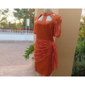 Special occasion burnt orange polycotton stretch dress.Stretch lace sleeves and waist overlay.38/14