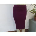 Sexy bodycon violet colour textured stretch polyester skirt.By RT size 34/36.Left front slit.As new