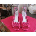 Pair of pink satin open toe/heel high heel shoes by JULIETTE from Melbourne.Size 7.As new.