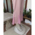 Dusty pink stretch polyester ankle length pants with sheer inlays at bottom,Size 36/12.Flat front.