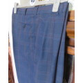 Handsomely tailored Men`s trousers by PRINGLE of SCOTLAND size 38 in navy check.Very good cond.