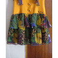 Cheeky mustard and sheer floral frilled dress for 8 to 9 yr old girl.(76cm) bust.New condition.