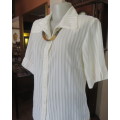 Classic sheer vertical striped polyester short sleeve top.Button down.Open collar.Size 36.Good cond