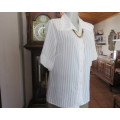 Classic sheer vertical striped polyester short sleeve top.Button down.Open collar.Size 36.Good cond