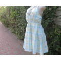 Empire style cool polycotton check dress with elastic waist and back.Shoulder straps,Size 40/16.
