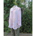 Smart creased polyester pale pink floral top.Bracelet length sleeves.By CLOTHING BARN size 44