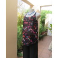 Cool black floral strappy top in polyester by IMAGE size 34/10. Sleeveless with round neckline.
