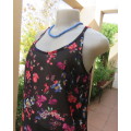 Cool black floral strappy top in polyester by IMAGE size 34/10. Sleeveless with round neckline.