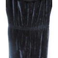 Black glamour stretch poly velvet jumpsuit calf length.Size 30/6.Scooped frilled neckline.As new.
