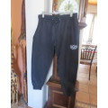 Men`s as new brushed polyester sweatpants. Knitted waist/drawstring and leg cuffs.Size XXL by RED