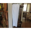 Handsome men`s white trousers by LION KNIGHT size 34 in cotton/terylene and silk.Pleated front.