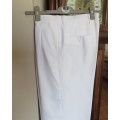 Handsome men`s white trousers by LION KNIGHT size 34 in cotton/terylene and silk.Pleated front.
