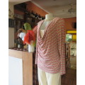 Smart soft long sleeve top in cream/brown/red block pattern.Cream underlay.Size 42/18.Cowl collar.