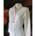 Tailored long sleeve pale pink button down top with V and open collar.Size large 34.By GALFIT Japan.