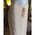 Bandless rich cream long pencil skirt with seam and braiding on front.Zip at back.Size 36/12 by ML.