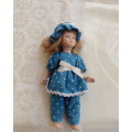 Antique doll 16cm tall with clothing. See all scans. In very good condition
