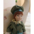 Antique doll 16cm tall with clothing. See all scans. Very good condition