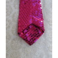 Hot pink sequin necktie with elastic.For evening/smart wear.Will brighten up any dull outfit.As new