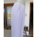 Ankle length lavender textured polyester pants with front pleats. Size 38/14 by FOSHINI. As new.
