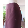 Smart dark mulberry 100% polyester bandless pencil skirt.Zip /slit at back.Size 40 by NEW ERA.As new