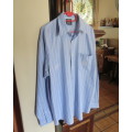 As new Men`s blue/white long sleeve SWD cricket shirt by FAIN size L.Pocket with logo.100% cotton.
