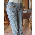 Striking vertical striped polycotton jeans in blue/cream.Size 34.Unique pockets. Yoked waistband.