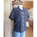 Beautiful structured stretch polyester denim short sleeve top size 42/18.Two flap pockets.As new