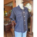 Beautiful structured stretch polyester denim short sleeve top size 42/18.Two flap pockets.As new