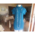 Knitted,as new, jade colour long acrylic/nylon knit tunic top. Polo neck collar.Size 34/10