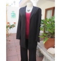 Sophisticated long black one button long sleeve jacket with open cloverleaf collar.Size 32/8.As new.