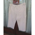 As new cropped 100% cotton pants in beige. Innovative back/front pockets. By INSYNC Plus size 42/18