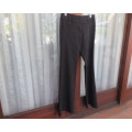 Smart black pen stripe bootlegged KELSO size 30/6 polyester/rayon stretch pants. New condition.