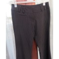 Smart black pen stripe bootlegged KELSO size 30/6 polyester/rayon stretch pants. New condition.