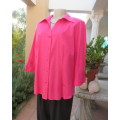 Tailored punch colour elbow sleeve button down top with V and open collar.Size 42/18 by DONATELLA.