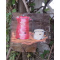 Unique junk art by DEON ASSUR 2012 on rusted metal. Red coffee pot with white mug.Size 36cm x 36cm
