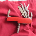 Swiss Gear 10 multitool red folding stainless steel knife. As new