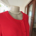Cherry red long sleeve warm viscose/poly stretch cropped jacket.Button down front. Size 38. New cond