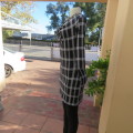 Monochrome check polyester stretch mini dress or long top size 30/6. Waterfall neckline.As new.