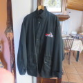 Black parka jacket in heavy cotton fully lined by CARTER HARRIS. Size XXL.Large pockets.Zipped front