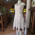 Fabulous strapless dress in peanut stretch nylon/rich cream acrylic lace. Size 34 by PARI & MAX.