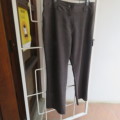 Dress pants in brown/beige check polyester/rayon blend.Size 42/18.By FASHION EXPRESS. Good cond.