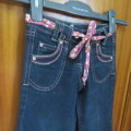 Cute dark blue denim stretch jeans by GOSSIP for 2 to 3 year old girl. With colourful belt. As new