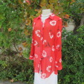 Eye catching red with white floral long top in sheer polyester. Cuffed sleeves. Size 36 by MILADY`S.